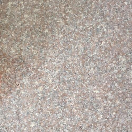 krämfärgade granitplattor